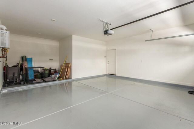 20783 W Pasadena Ave, Buckeye, AZ 85396 - garage with a garage door opener and baseboards