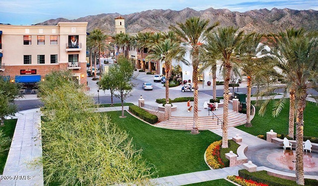 20783 W Pasadena Ave, Buckeye, AZ 85396 - view of home's community with a mountain view and a lawn