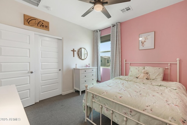 carpeted bedroom with a closet, ceiling fan, and baseboards