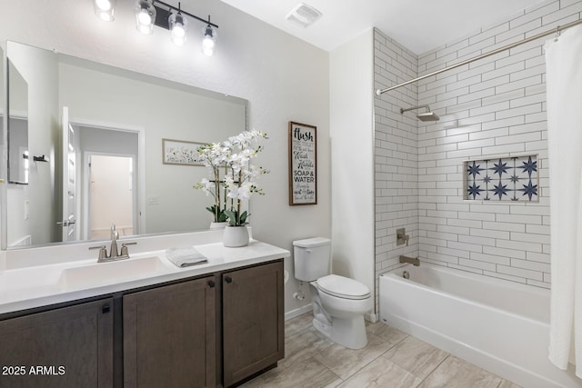 full bathroom featuring toilet, shower / tub combo, and vanity