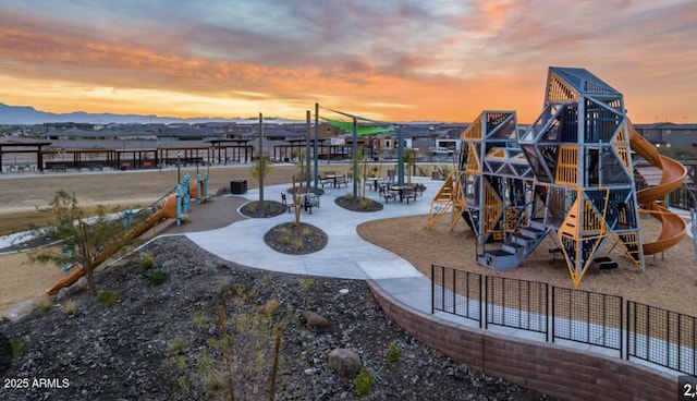 view of property's community with a patio area