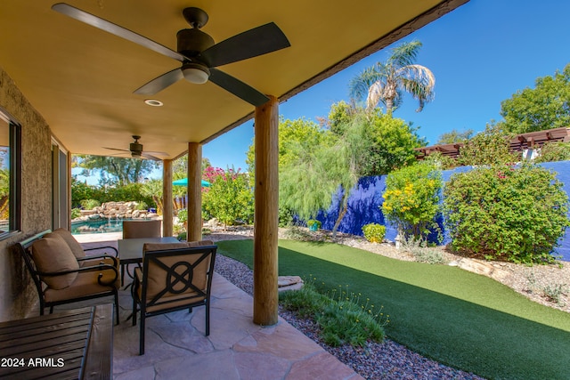 view of patio / terrace featuring ceiling fan