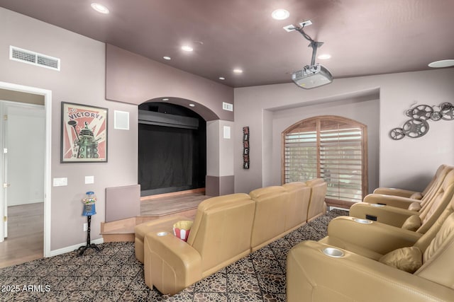 home theater room with dark wood-type flooring