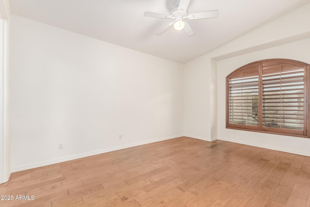 spare room with ceiling fan and light hardwood / wood-style flooring