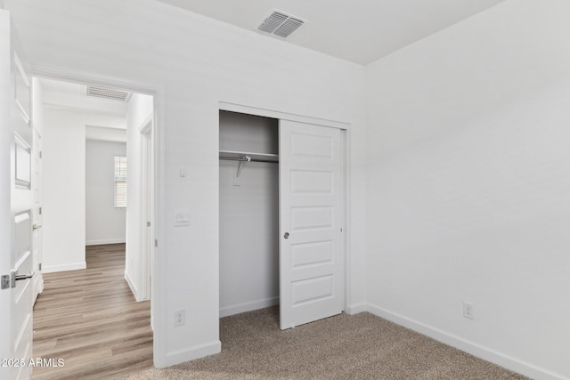 unfurnished bedroom featuring a closet