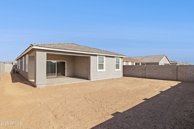 back of property featuring a patio area