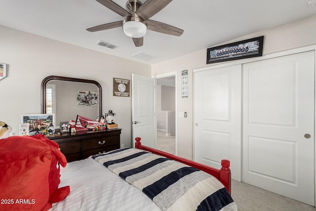 bedroom with light carpet, a closet, and ceiling fan