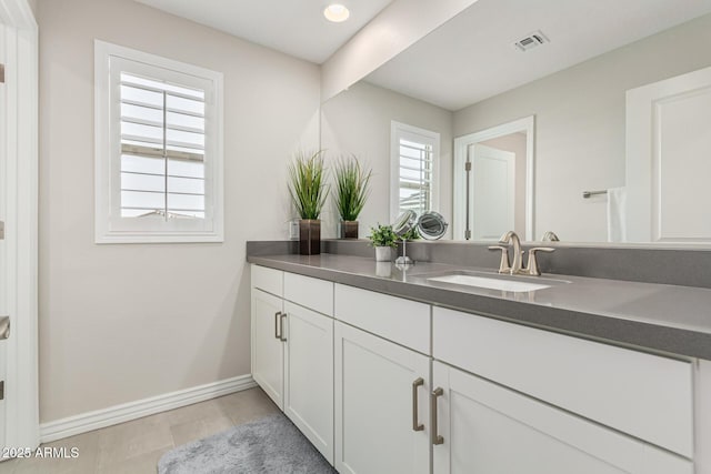 bathroom featuring vanity and tile patterned floors