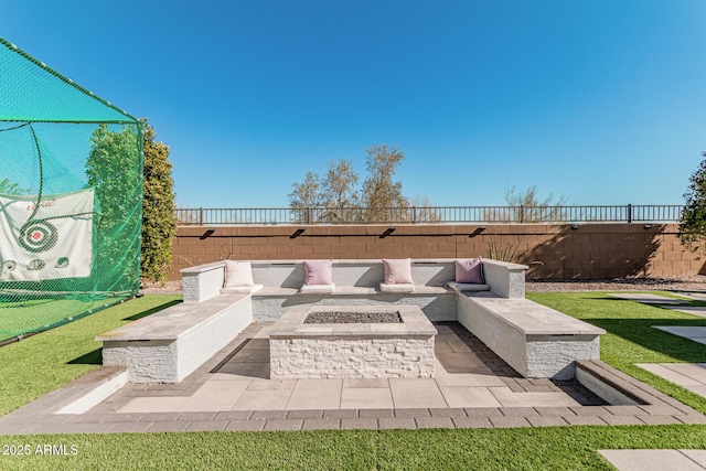 view of patio / terrace with an outdoor fire pit