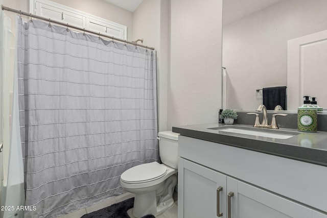 full bathroom featuring vanity, tile patterned flooring, toilet, and shower / tub combo with curtain