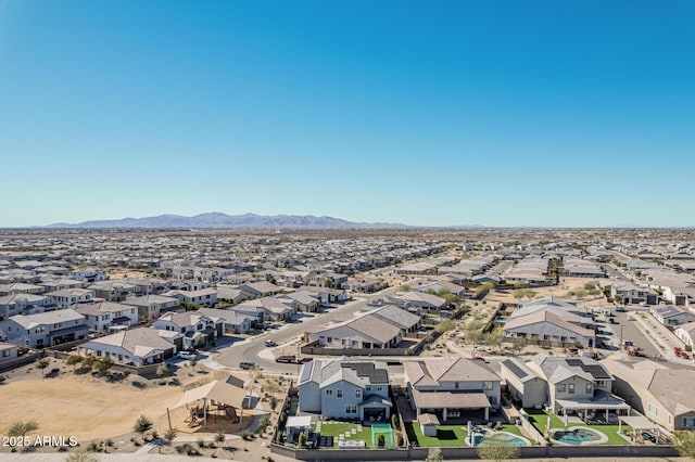 birds eye view of property featuring a mountain view