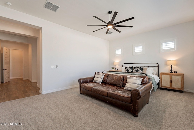 bedroom with carpet, visible vents, ceiling fan, and baseboards