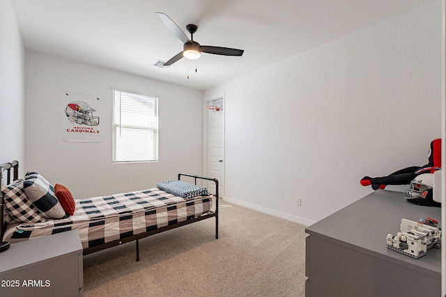 bedroom featuring light carpet, ceiling fan, visible vents, and baseboards