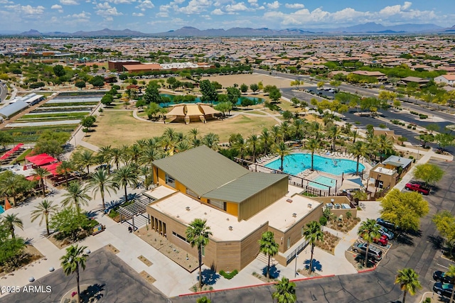 birds eye view of property featuring a mountain view