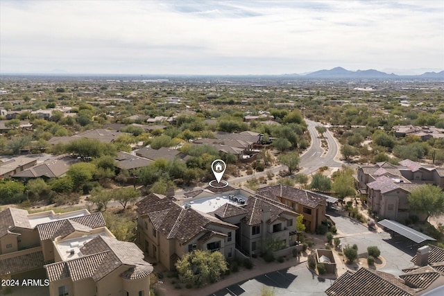 drone / aerial view featuring a mountain view