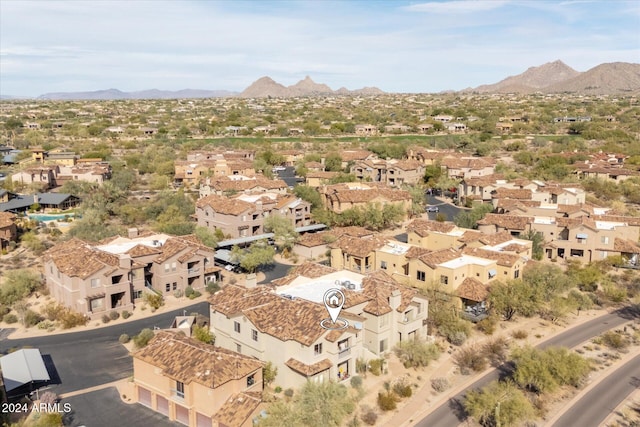 drone / aerial view featuring a mountain view