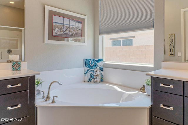 bathroom featuring a bathtub and vanity