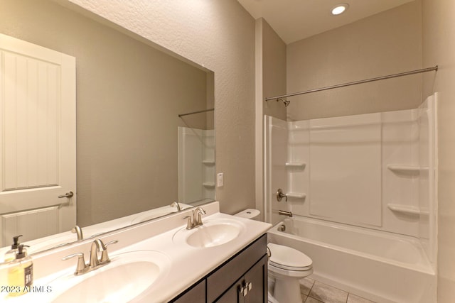 full bathroom with toilet, vanity, tile patterned floors, and tub / shower combination