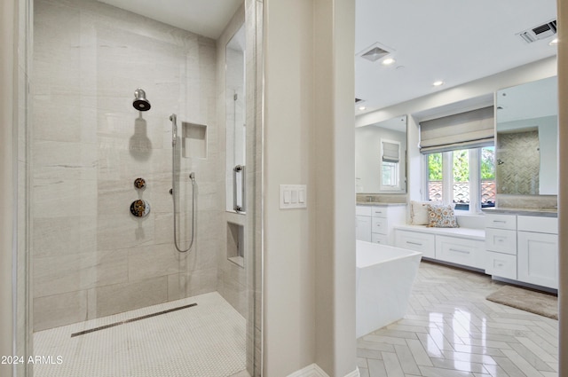 10191 E Diamond Rim Dr Unit 2122, Scottsdale, AZ 85255 - bathroom featuring a shower stall, a soaking tub, vanity, and recessed lighting
