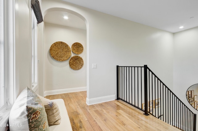 staircase featuring wood-type flooring