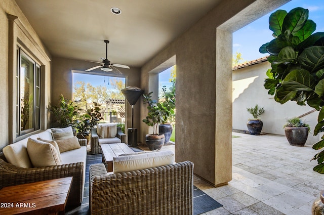 view of patio featuring an outdoor hangout area and ceiling fan