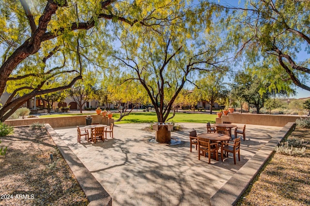 view of property's community featuring a patio area