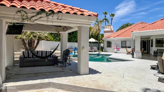 view of swimming pool featuring a patio area