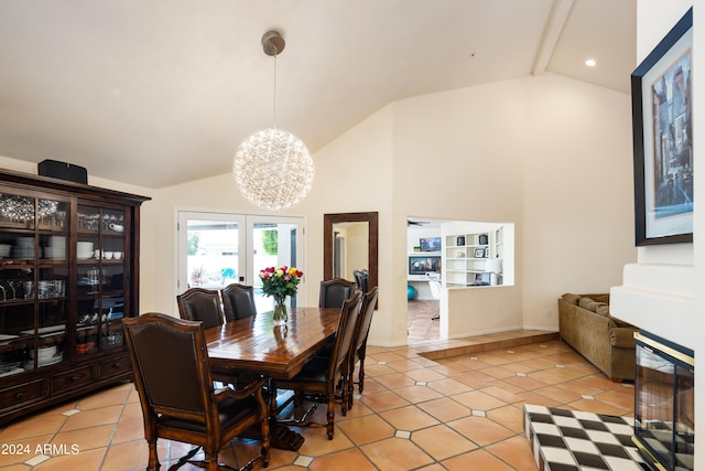 tiled dining room with a chandelier and vaulted ceiling with beams