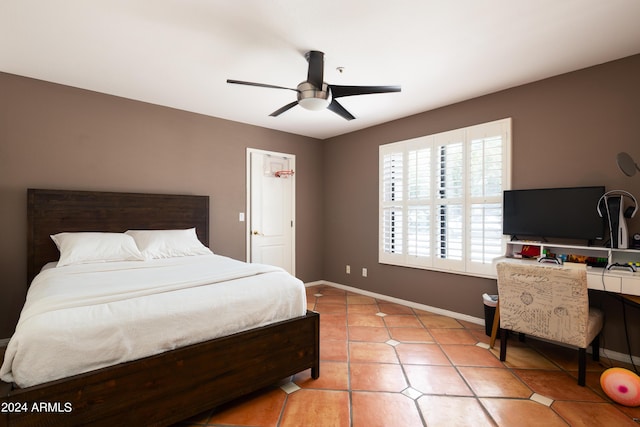 bedroom with light tile patterned floors and ceiling fan