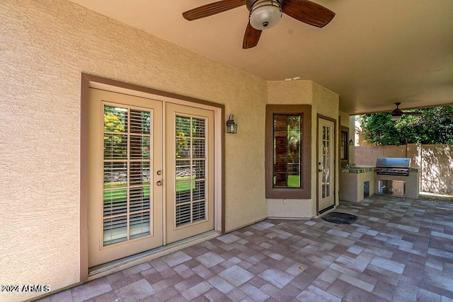 view of patio with french doors, grilling area, and ceiling fan