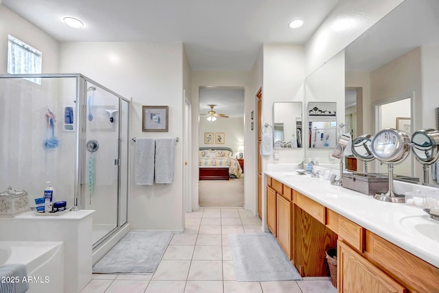 3336 W King Dr, Anthem, AZ 85086 - bathroom featuring ensuite bath, a stall shower, double vanity, and a bath