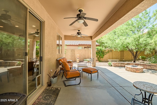 3336 W King Dr, Anthem, AZ 85086 - fenced backyard featuring a fire pit, a patio area, and a ceiling fan