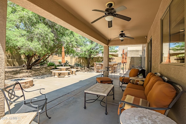 3336 W King Dr, Anthem, AZ 85086 - fenced backyard featuring a patio, outdoor dining space, a ceiling fan, and outdoor lounge area