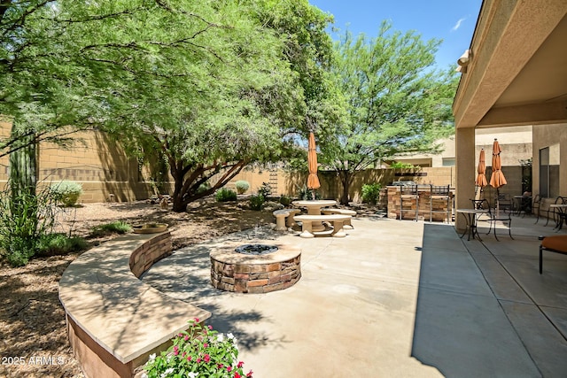 3336 W King Dr, Anthem, AZ 85086 - fenced backyard with an outdoor fire pit and a patio area