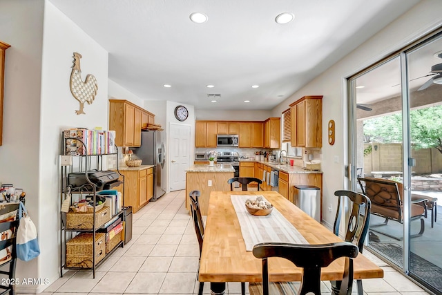 3336 W King Dr, Anthem, AZ 85086 - dining room with light tile patterned floors, recessed lighting, and a ceiling fan