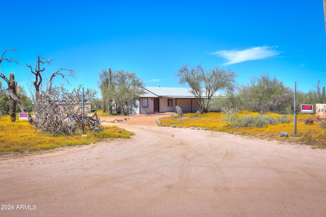 30240 N 60th St, Cave Creek, AZ 85331 - view of front of house with dirt driveway