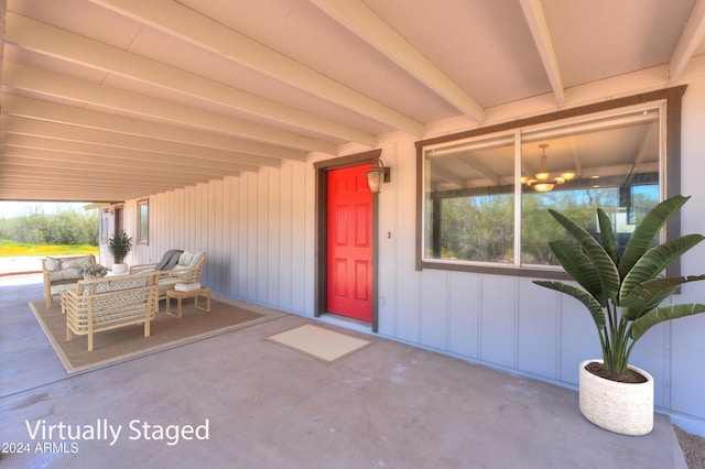 entrance to property featuring a patio