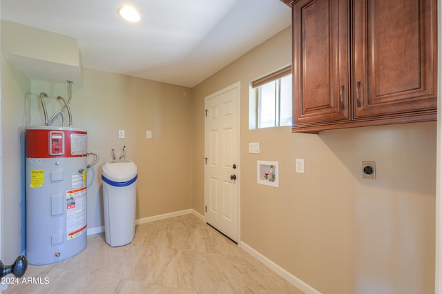 clothes washing area with water heater, washer hookup, cabinets, and electric dryer hookup