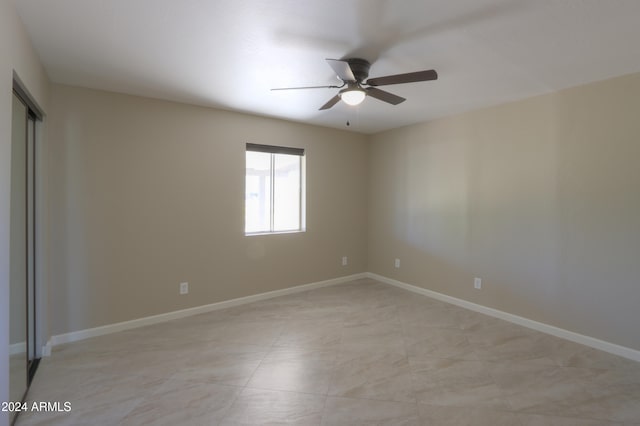 unfurnished room featuring ceiling fan