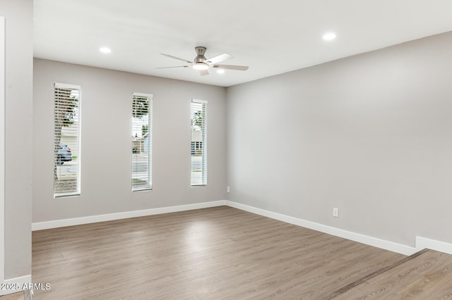 unfurnished room with recessed lighting, ceiling fan, baseboards, and wood finished floors