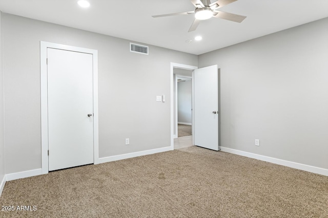 unfurnished bedroom with ceiling fan, recessed lighting, visible vents, baseboards, and carpet