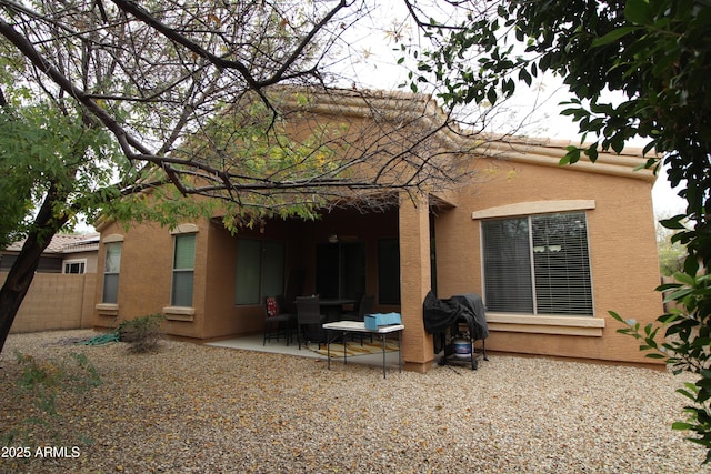 back of house featuring a patio