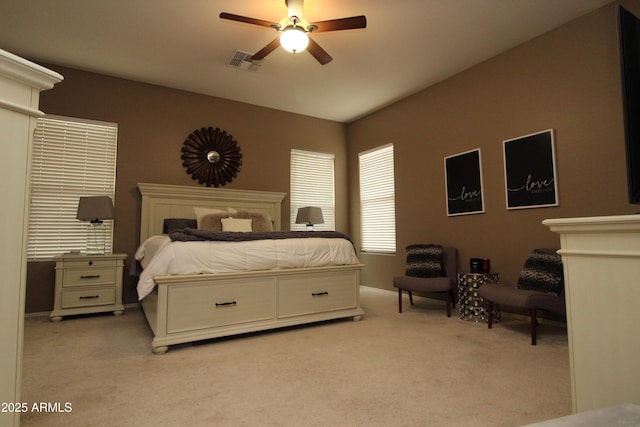 carpeted bedroom with ceiling fan