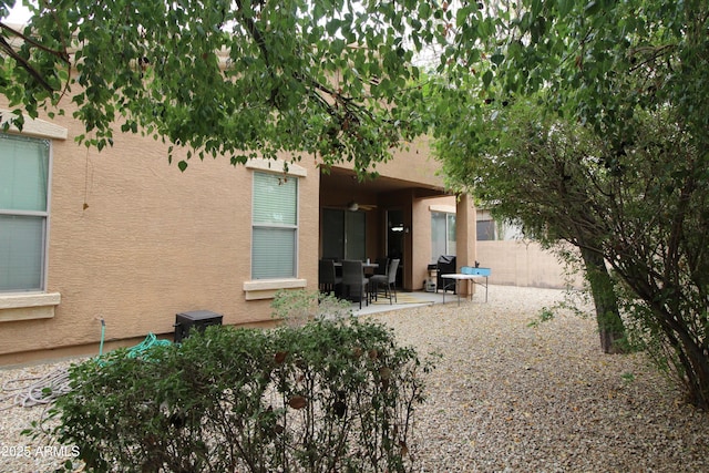 rear view of house with a patio