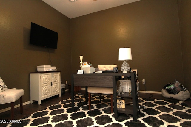 office with dark hardwood / wood-style flooring