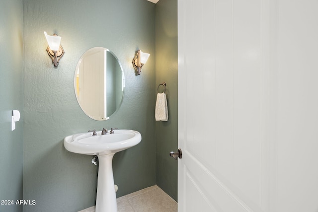 bathroom with tile patterned flooring