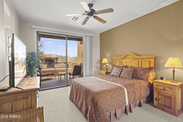 bedroom featuring light carpet, access to exterior, and ceiling fan