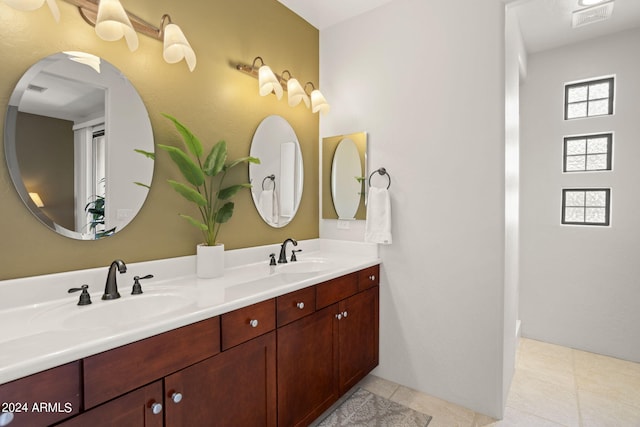 bathroom with vanity and tile patterned floors