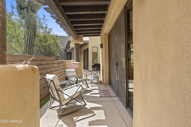 balcony featuring grilling area and a patio