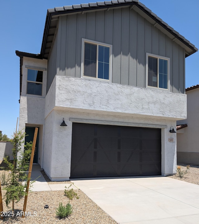 9408 E Sequence Ave, Mesa, AZ 85212 - modern home with a garage and board and batten siding